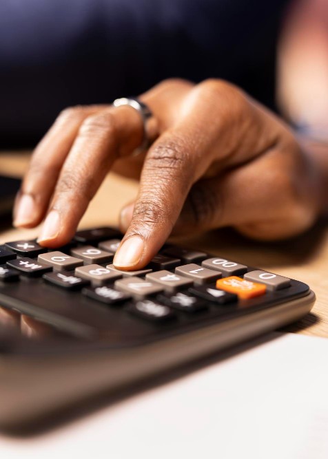picture of someone using a calculator