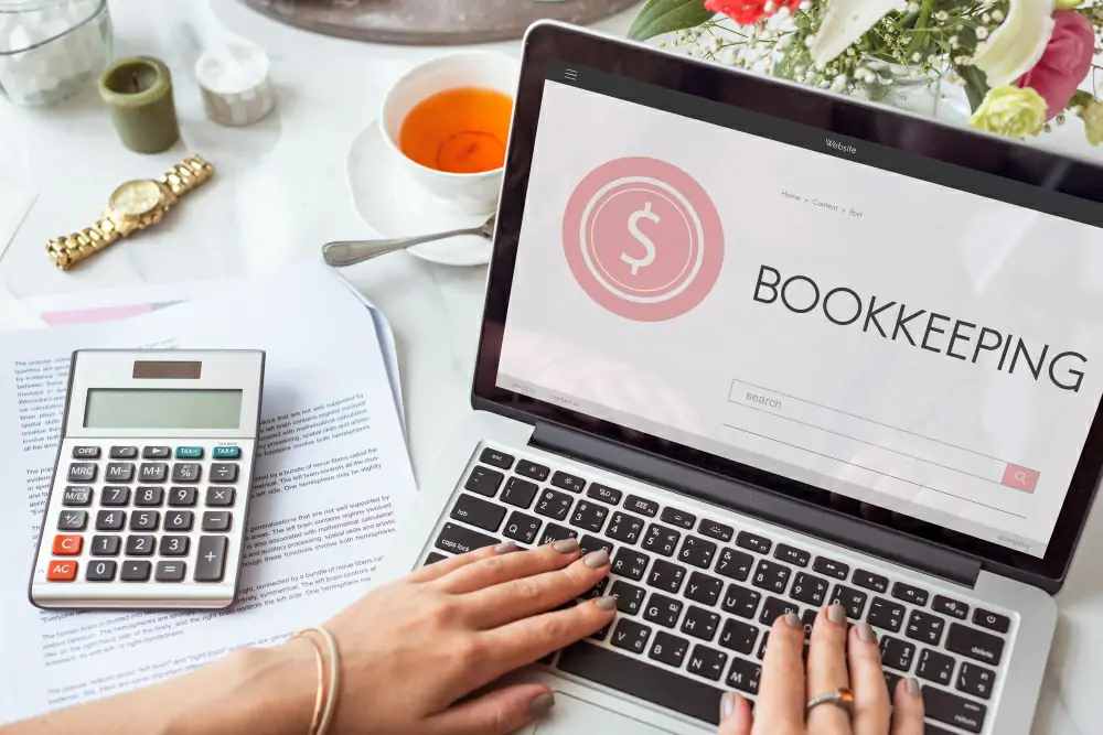 laptop screen displaying the word bookeeping