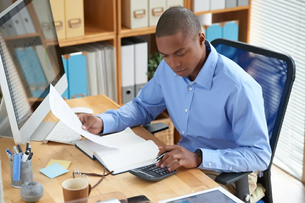 man looking at documents